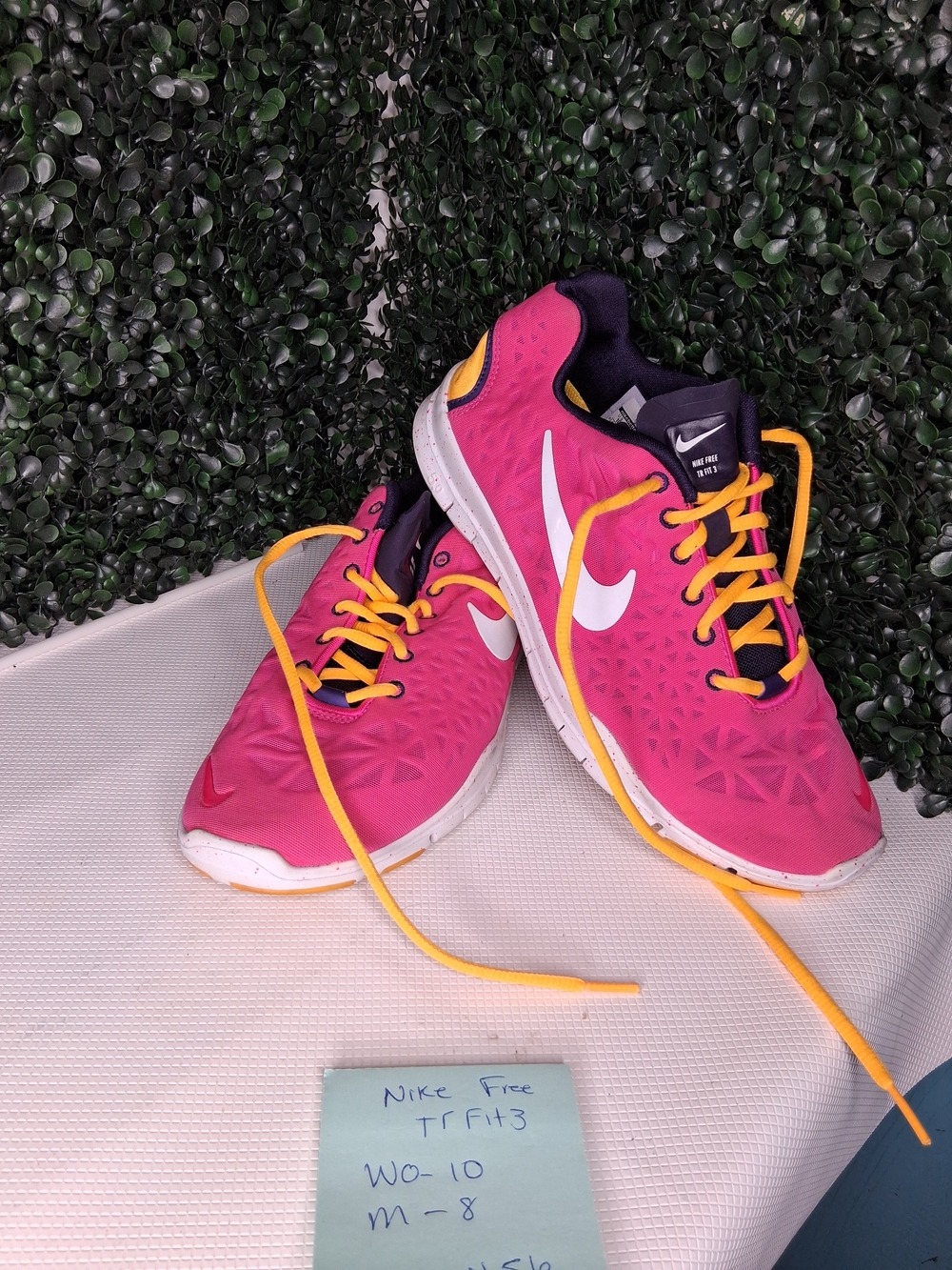 Nike Women’s Pink Training Sneakers with Yellow Laces